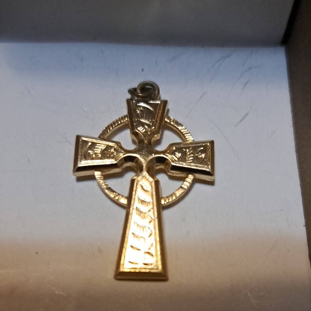Elegant And Charming Gold Cross Pendant